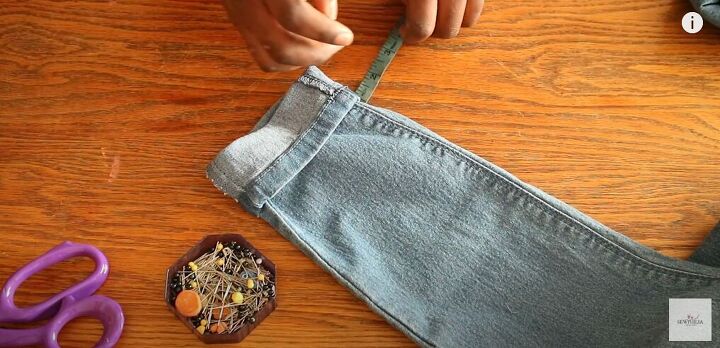 easy sewing hack for when your jeans are too long, Pinning it in the place