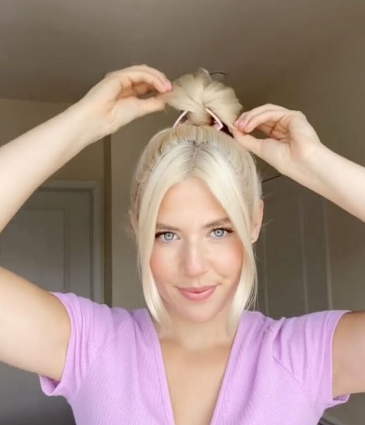 create the messy bun look with a claw clip