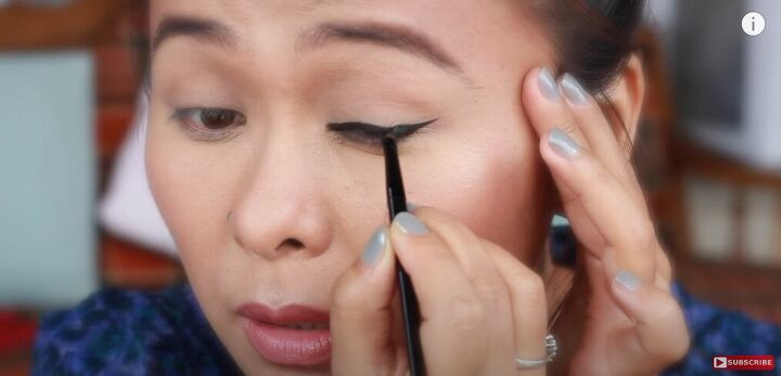 classic and easy black winged eyeliner tutorial, Filling in any gaps