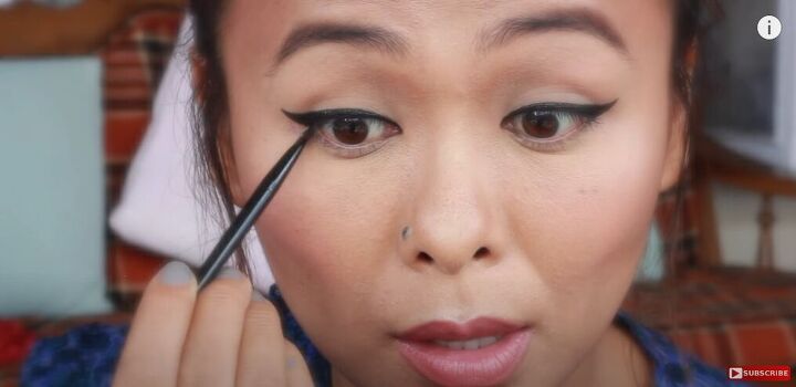 classic and easy black winged eyeliner tutorial, Repeating process on the other eye