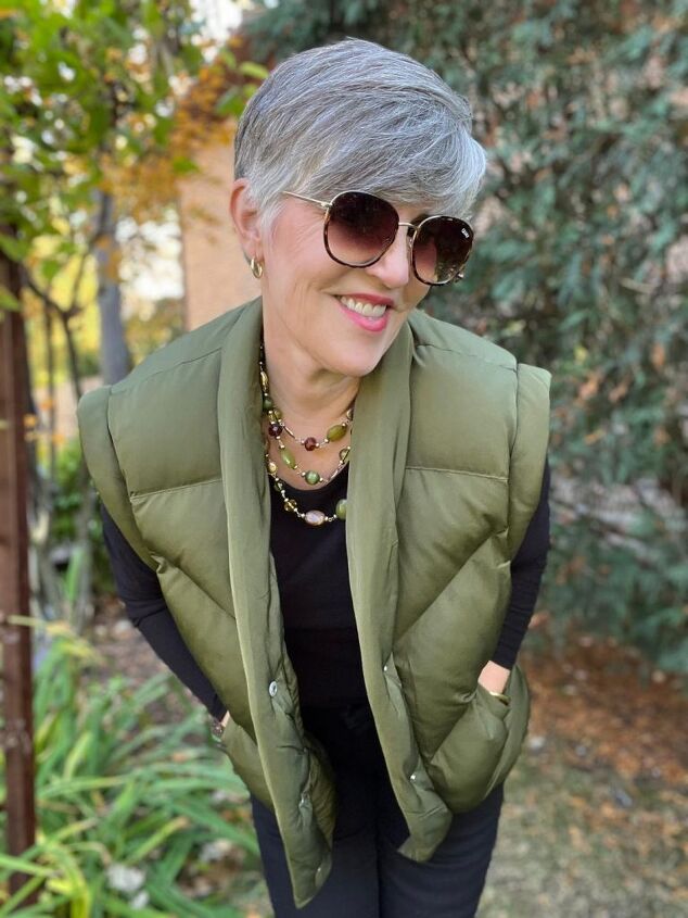 what to wear for thanksgiving, This fourth outfit is a layered look where I took black jeans a black tee and black booties and I added an olive green Evereve puffer vest I also layered a colorful scared over a pretty inexpensive statement necklace Here is a closeup of the necklace