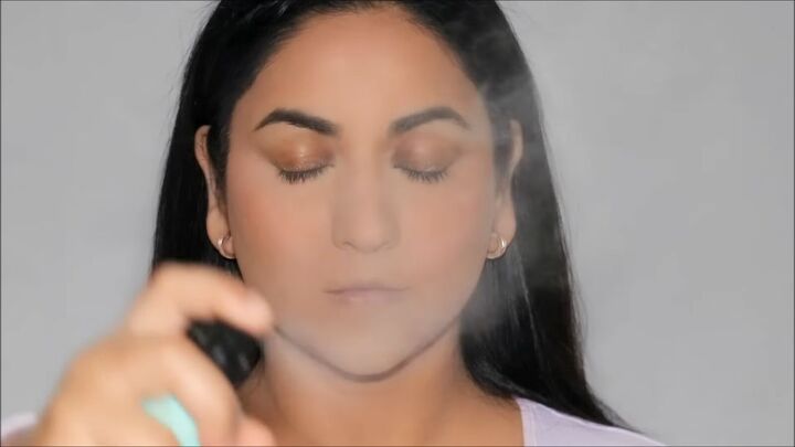 blush hack tutorial how to get airbrushed looking skin, Applying setting spray