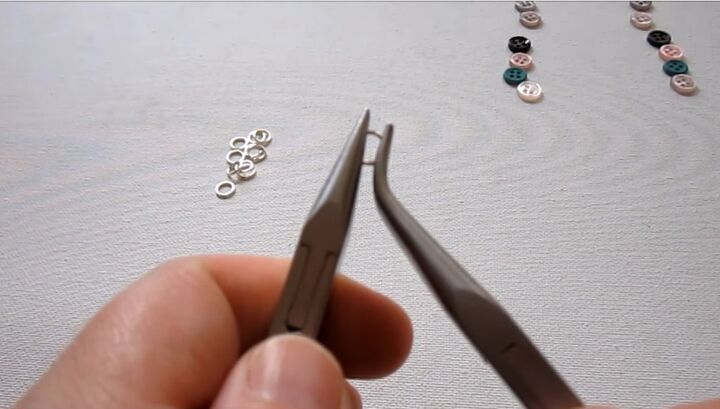 how to make cute button earrings, Opening up the jump rings