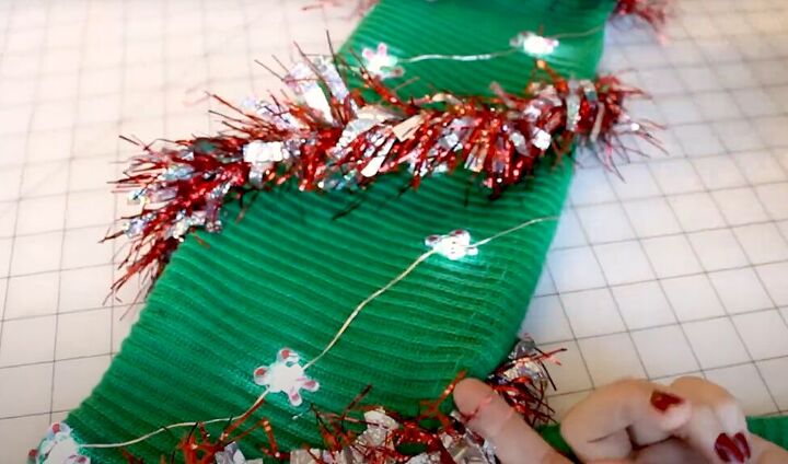 how to diy a tacky but super cute christmas sweater, Adding tinsel