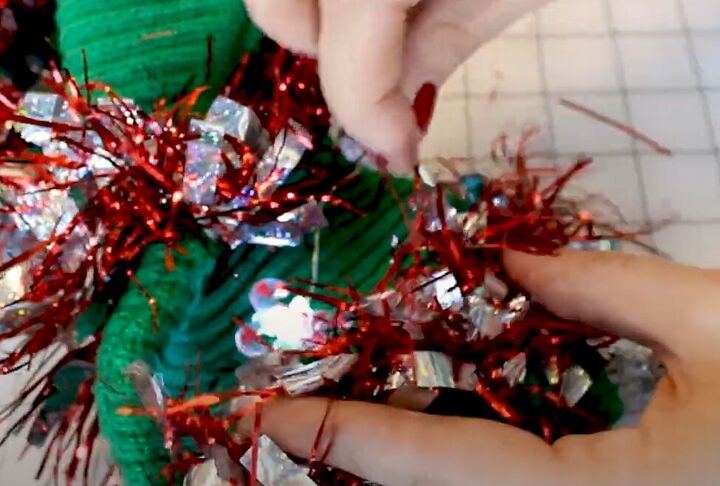 how to diy a tacky but super cute christmas sweater, Adding tinsel