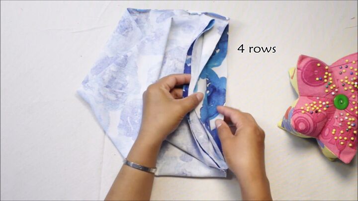 how to sew an easy twist beanie hat, Pinning and sewing the raw edge