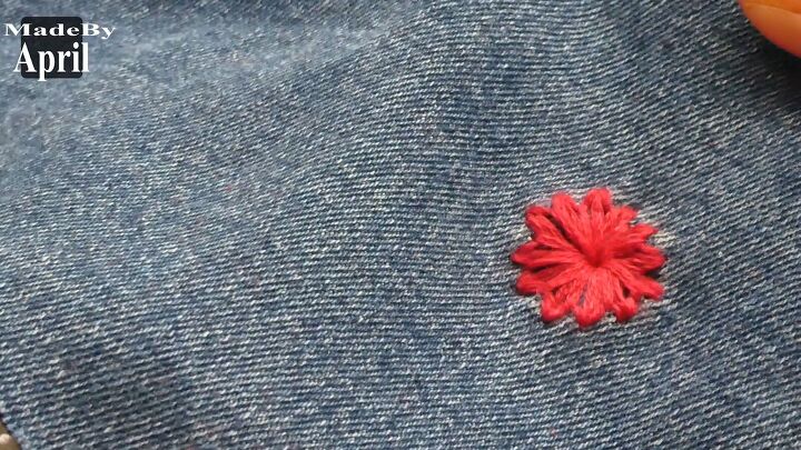 save your favorite jeans with this easy embroidery hole repair hack, Embroidery flower