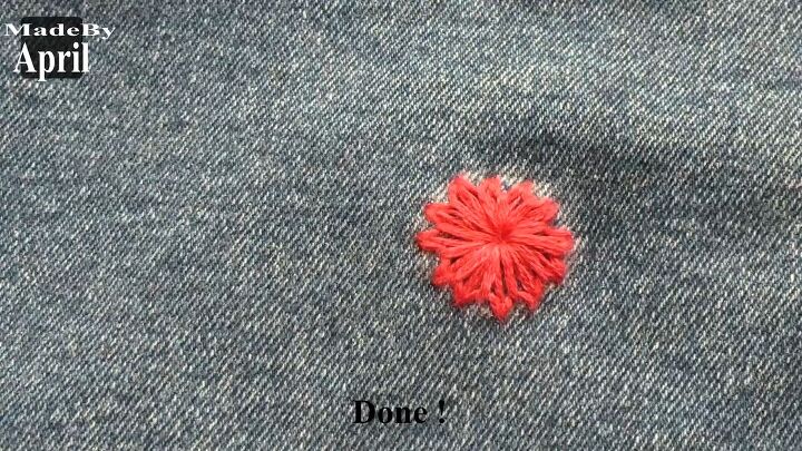 save your favorite jeans with this easy embroidery hole repair hack, Completed flower embroidery hole repair