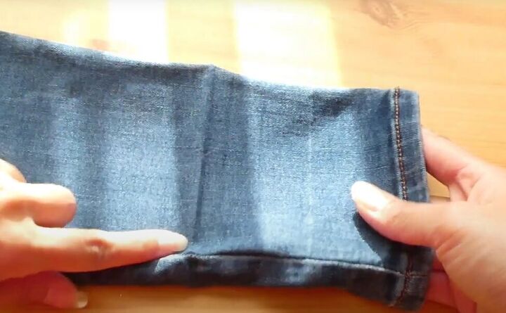 quick and easy tutorial on hemming jeans, Unfolding the hem