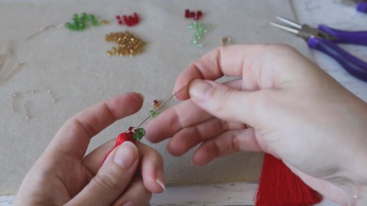 how to create a pair of gorgeous christmas earrings, Adding crystals to the eye pin