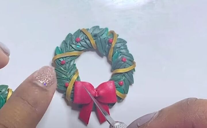 how to make super cute polymer clay christmas wreath earrings, Adding berries to the wreath