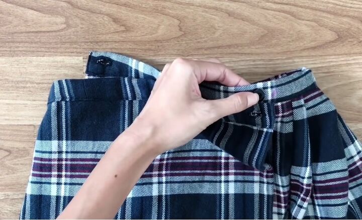 how to sew a super cute rachel green skirt from an old plaid shirt, Sewing on the buttons