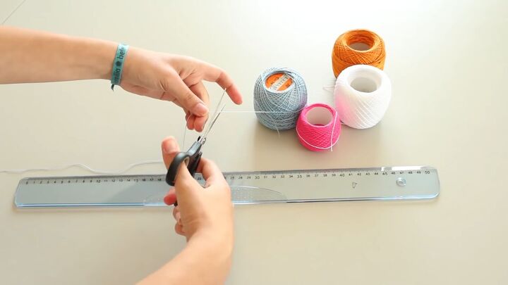 how to diy a super cute and easy wrap friendship bracelet, Cutting thread for DIY wrap bracelet