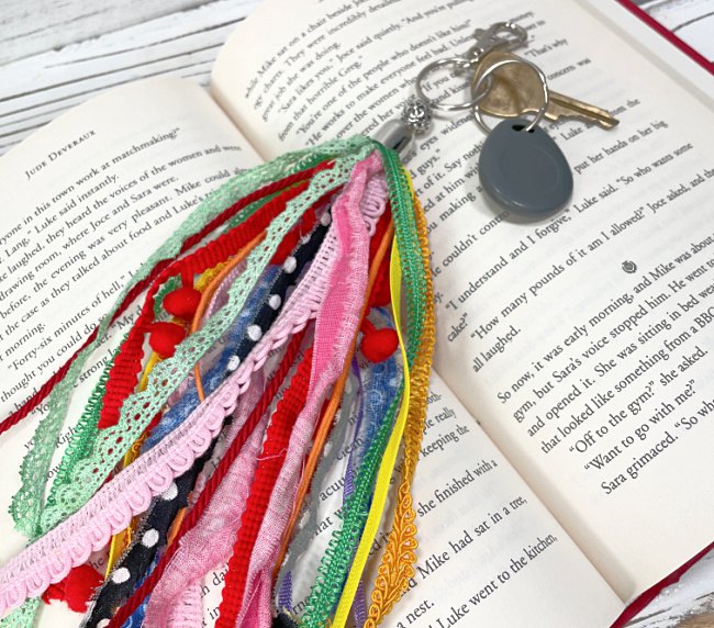 diy tassel keychain, DIY Tassel Keyring Tutorial to Make Using Pieces of Ribbon Trim and Fabric Scraps Creates great easy to make gifts for friends dity howtomakeatassel