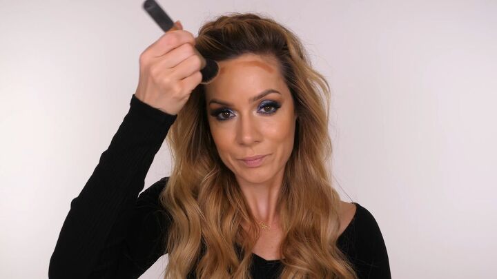 wow with this glam holiday party eye makeup, Adding bronzer