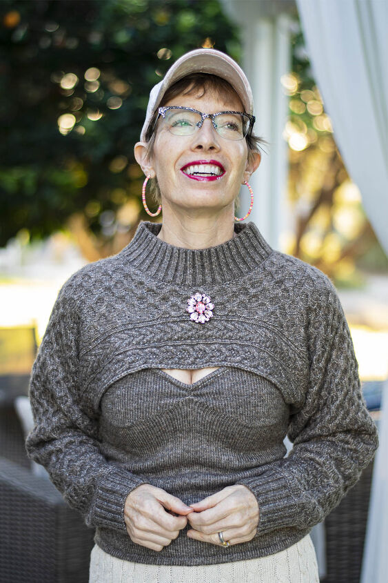 Adding a brooch to a textured sweater