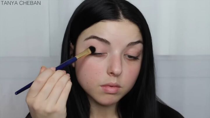 how to achieve a super glam rose gold eyeshadow look for christmas, Adding base shade