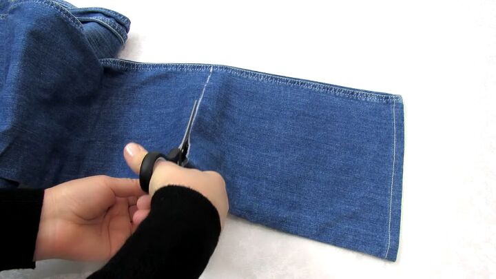 how to diy a cute jean purse from old jeans, Cutting the jeans