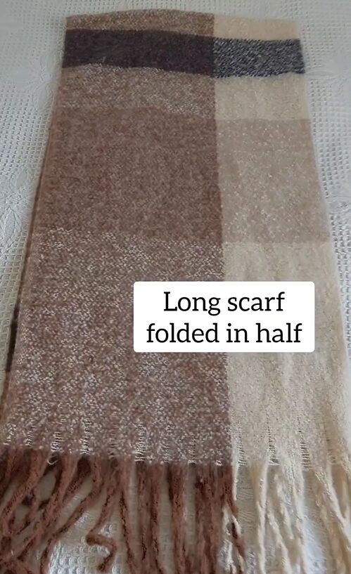 fold a scarf in half for this genius hack, Long scarf folded in half