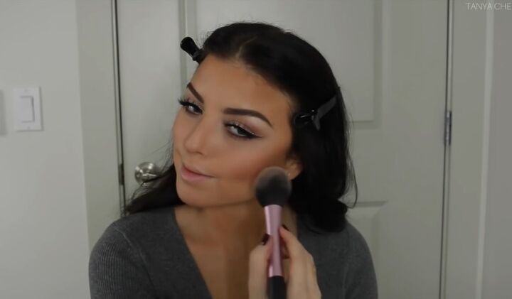 festive bold red lip and glitter eyeliner makeup tutorial, Applying blush