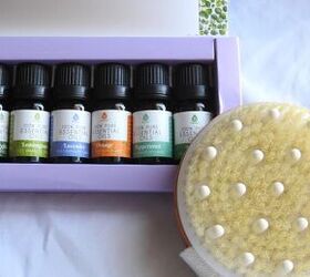 a box of essential oils and exfoliating scrubber