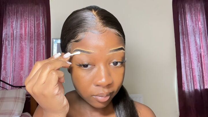 super easy clean girl makeup tutorial, Applying concealer to brows