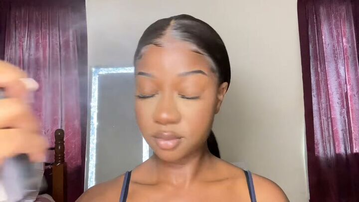 super easy clean girl makeup tutorial, Applying finishing spray