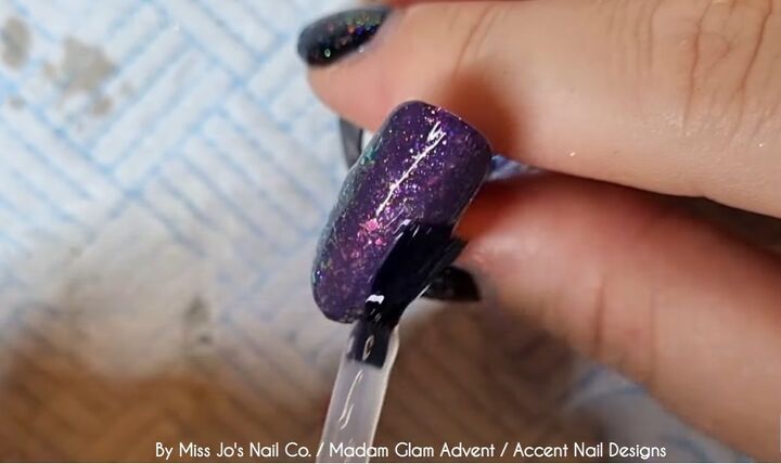 how to create a festive snowflake nail design in 8 easy steps, Applying topcoat