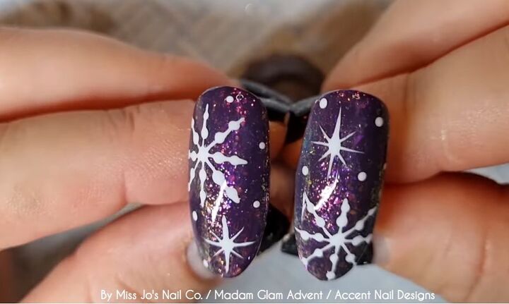 how to create a festive snowflake nail design in 8 easy steps, Completed snowflake nail design