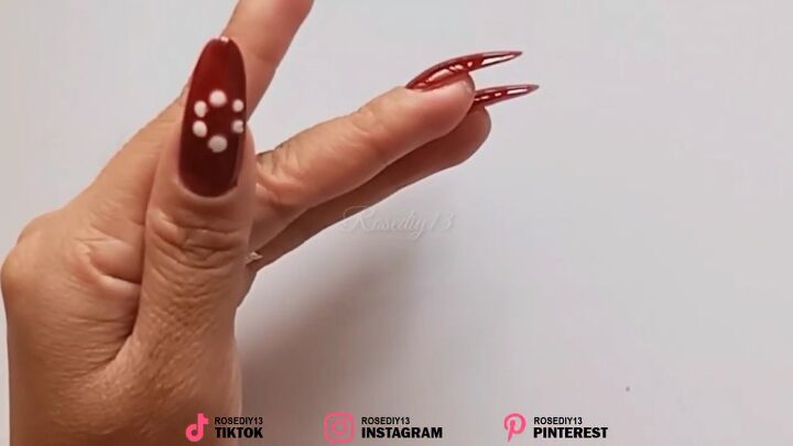 how to diy easy red swirl nails for christmas, Creating a circle with dots