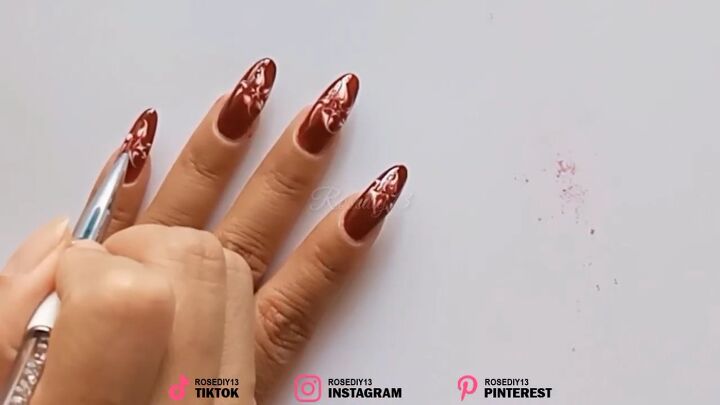 how to diy easy red swirl nails for christmas, Drawing red swirl nail design