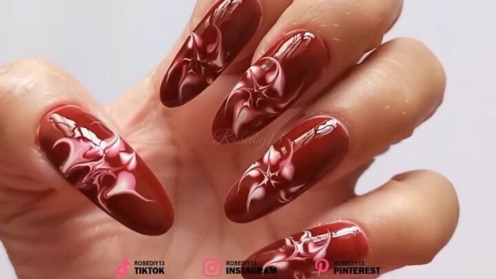 how to diy easy red swirl nails for christmas, Completed red swirl nails