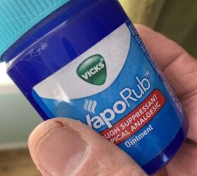 Dab a few drops of Vicks VapoRub on your hands to instantly solve this common winter-related problem