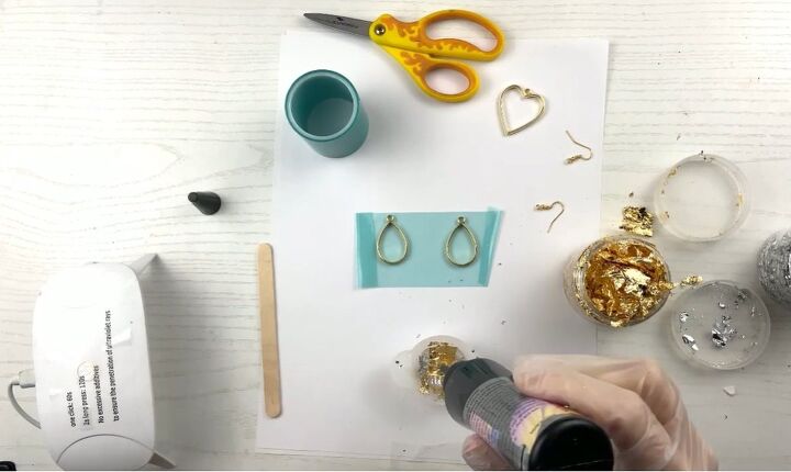 how to diy cute uv resin earrings, Adding resin
