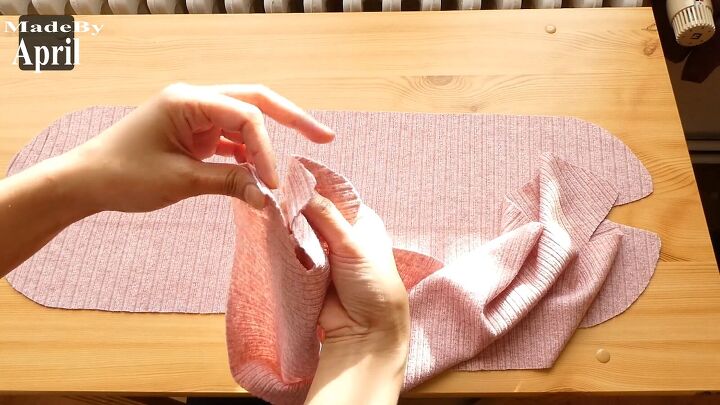 how to make a super cozy beanie with pom poms, Folding fabric