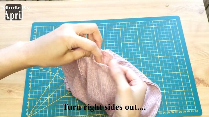 how to make a super cozy beanie with pom poms, Reversing the fabric
