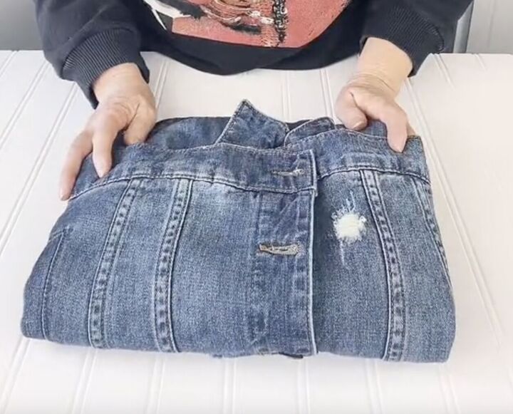 How to Fold Your Denim Jacket to Save Space | Upstyle