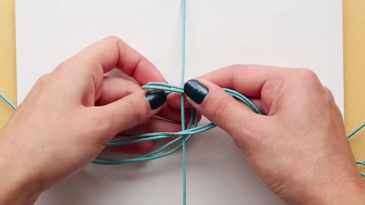 how to create a super cute leather friendship bracelet, Starting the braid