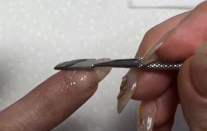 simple nails refresh tutorial how to make your manicure last longer, Cleaning up cuticles