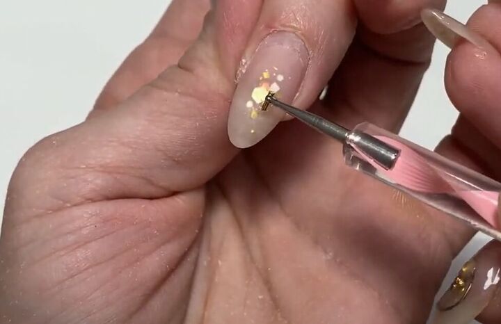 simple nails refresh tutorial how to make your manicure last longer, Replacing nail jewels
