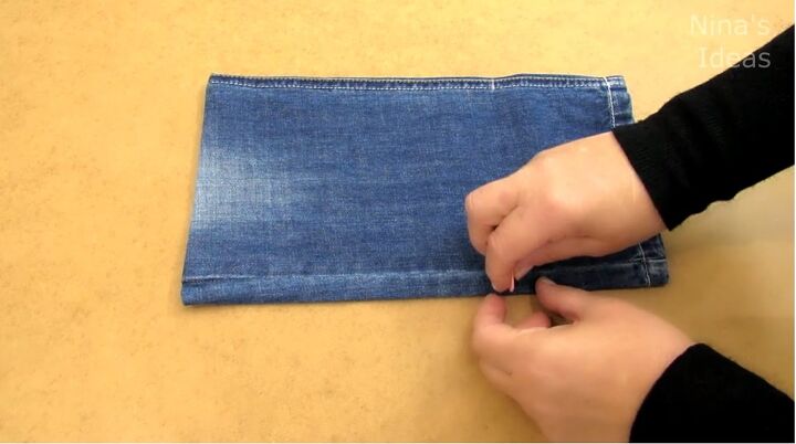 how to diy a cute chain jean bag, Marking the fold