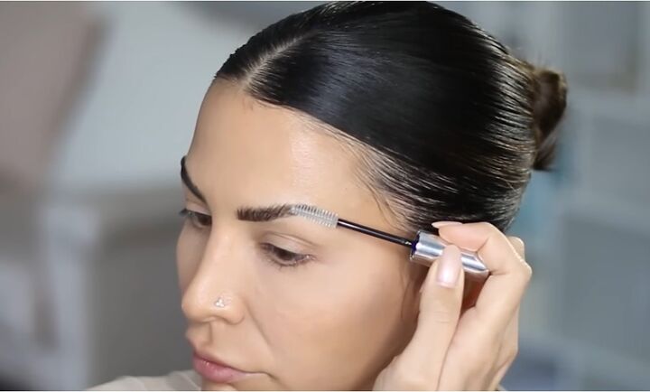 best clean girl makeup tutorial, Applying brow gel