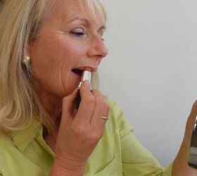 easy neutral makeup look for older women, Applying lipstick