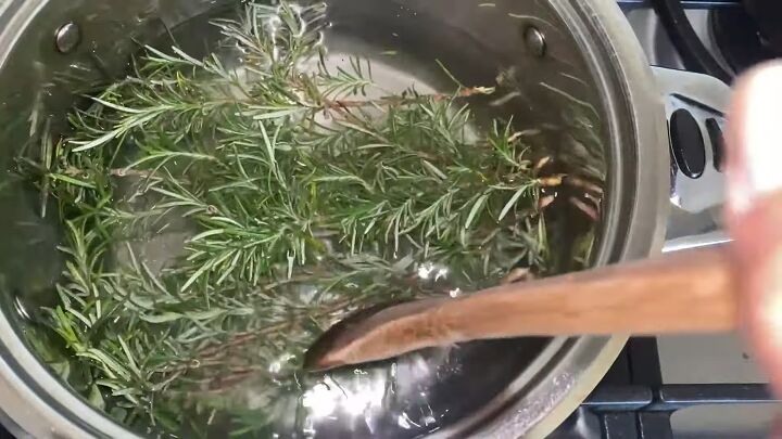 super easy recipe how to mix essential oils for hair growth, Submerging the rosemary