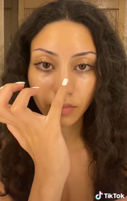 super easy sunscreen contouring tutorial, Applying sunscreen to the nose