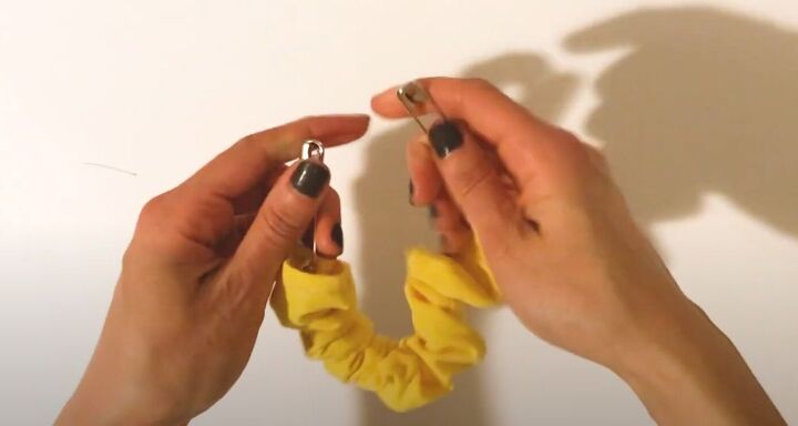 how to diy a super cute bow scrunchie from an old t shirt, Inserting elastic