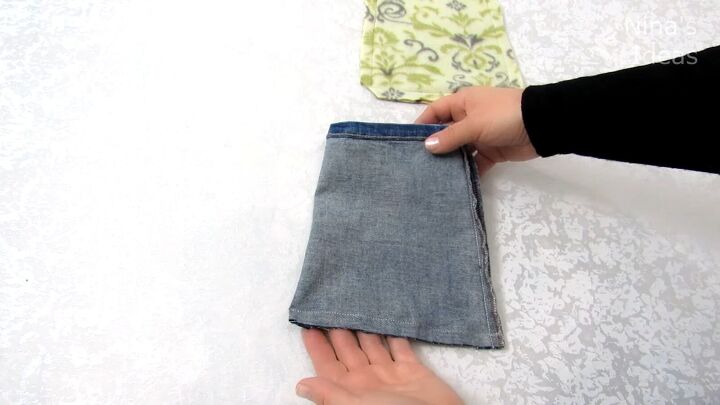 how to diy a cute and easy denim pouch, Hemming bottom of the bag