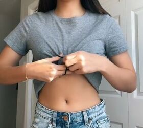 easy hack how to turn a t shirt into crop top without cutting, Wrapping bangle with hair elastic