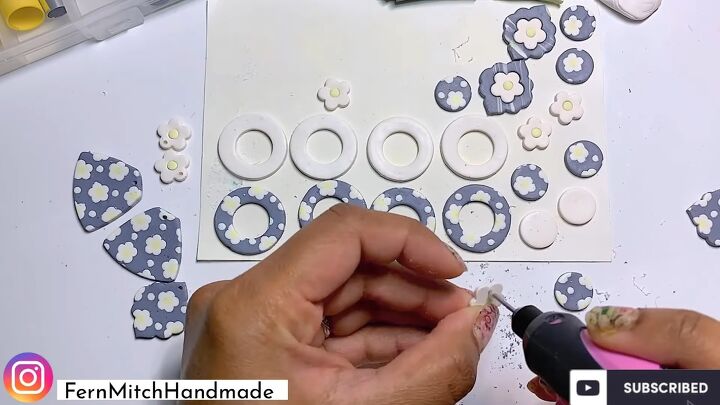how to diy cute floral polymer clay earrings, Drilling holes