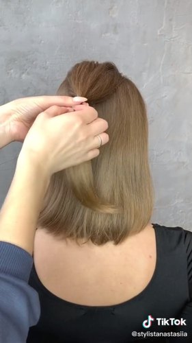 beautiful half up hairstyle sure to impress, Tying back top layer of hair